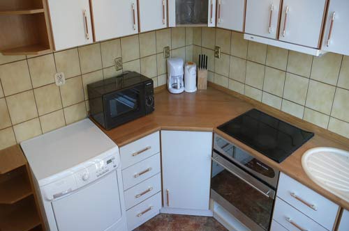 Apartament Gdask Mariacka 80-833 Gdask ul. Mariacka 14-15 Kuchnia, kompletnie wyposaona. Kuchenka elektryczna i piekarnik, ekspres do kawy, lodwko zamraarka, kuchenka mikrofalowa i suszarka do ubra